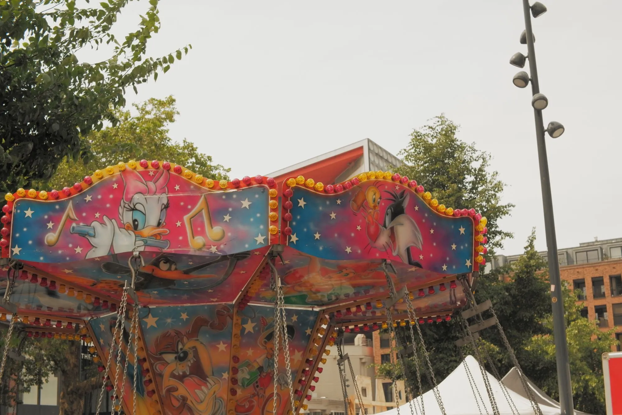 2026-05-31 - Top of carousel with cartoon characters on it