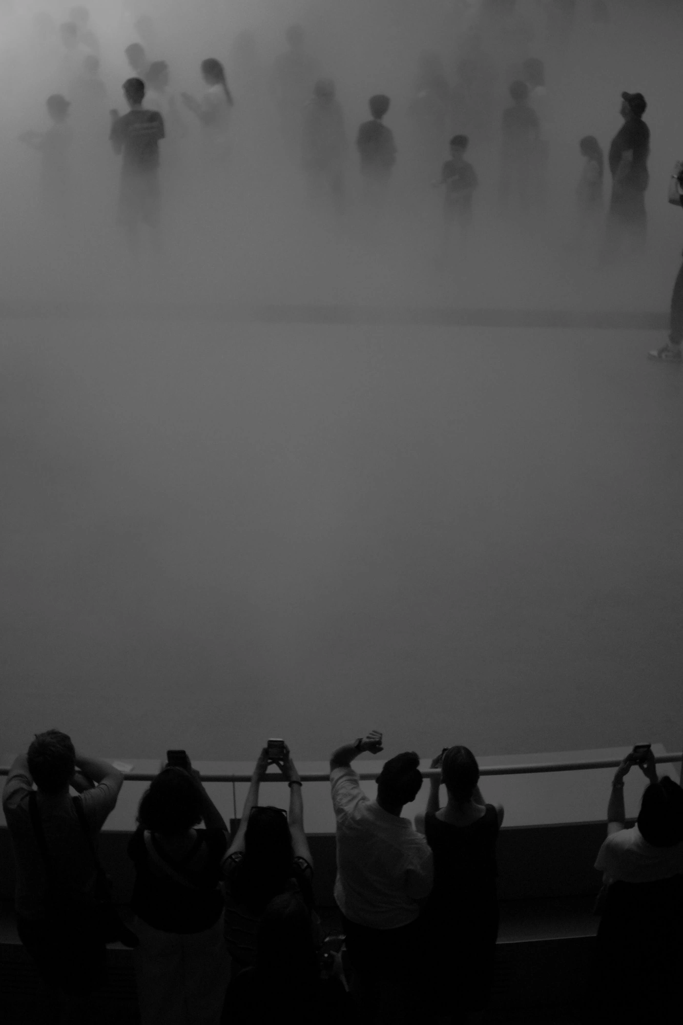 People taking photos of people in Cloud