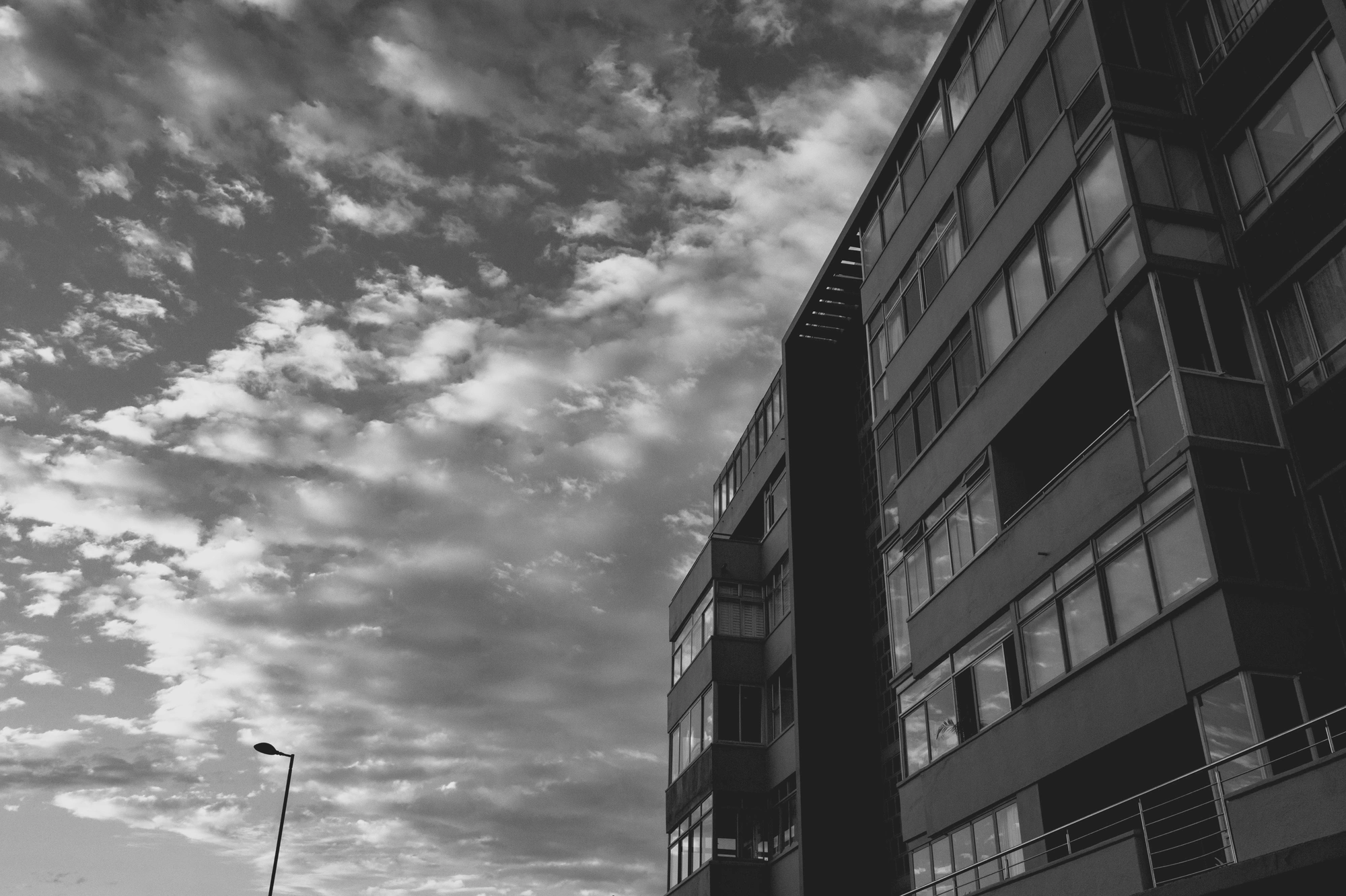 2022-02-13 - xt15-45 - bw - ZA - Cape Town - Clouds reflecting off windows at sunrise