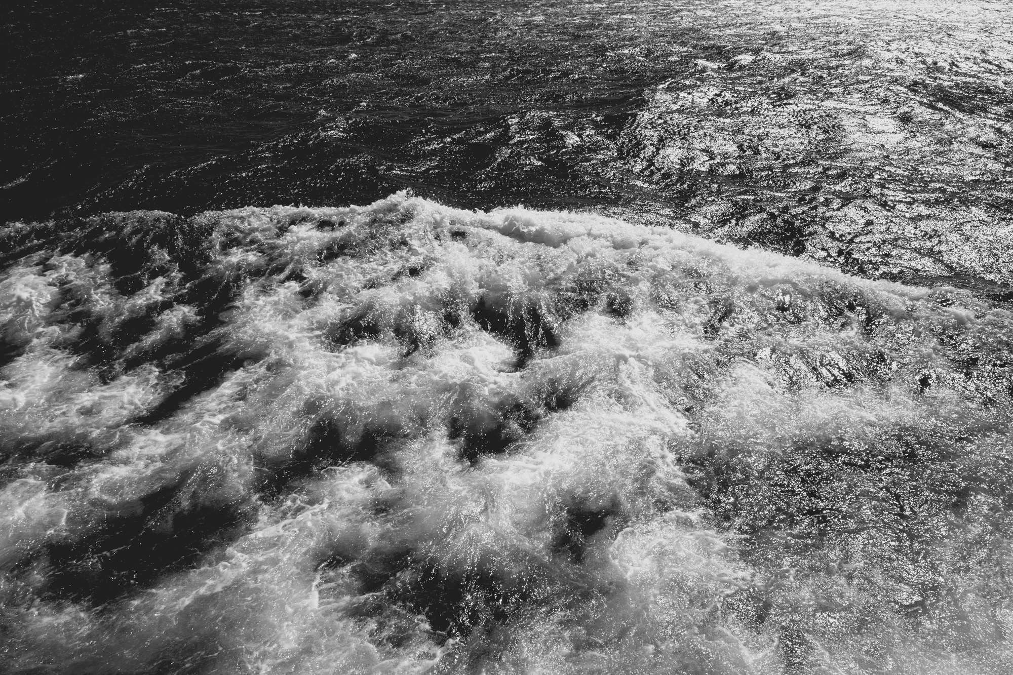 2022-02-13 - xt15-45 - bw - ZA - Cape Town -Small waves moving along the surface of the ocean