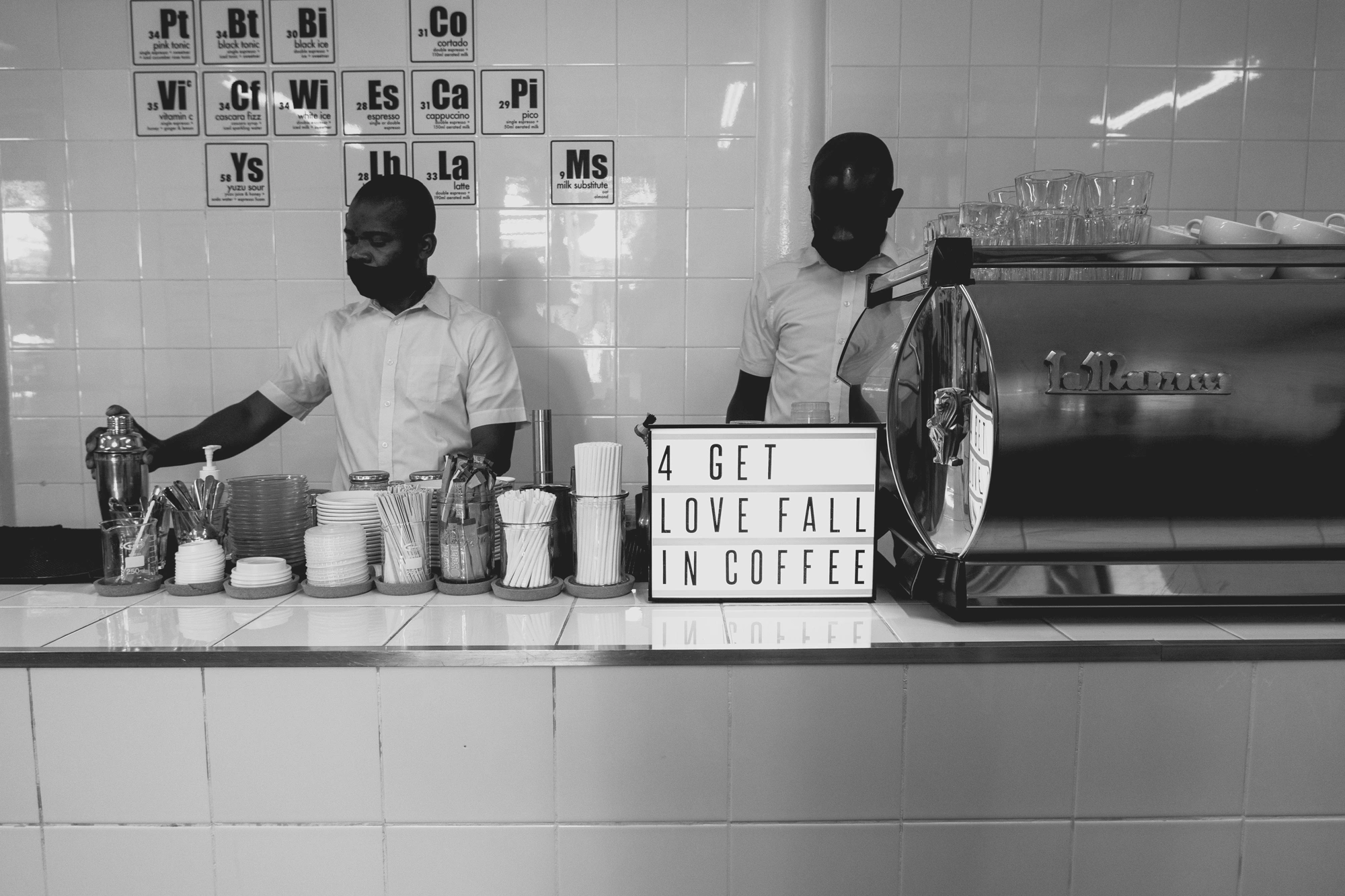 2022-02-14 - xt15-45 - bw - ZA - Cape Town - Baristas making coffee
