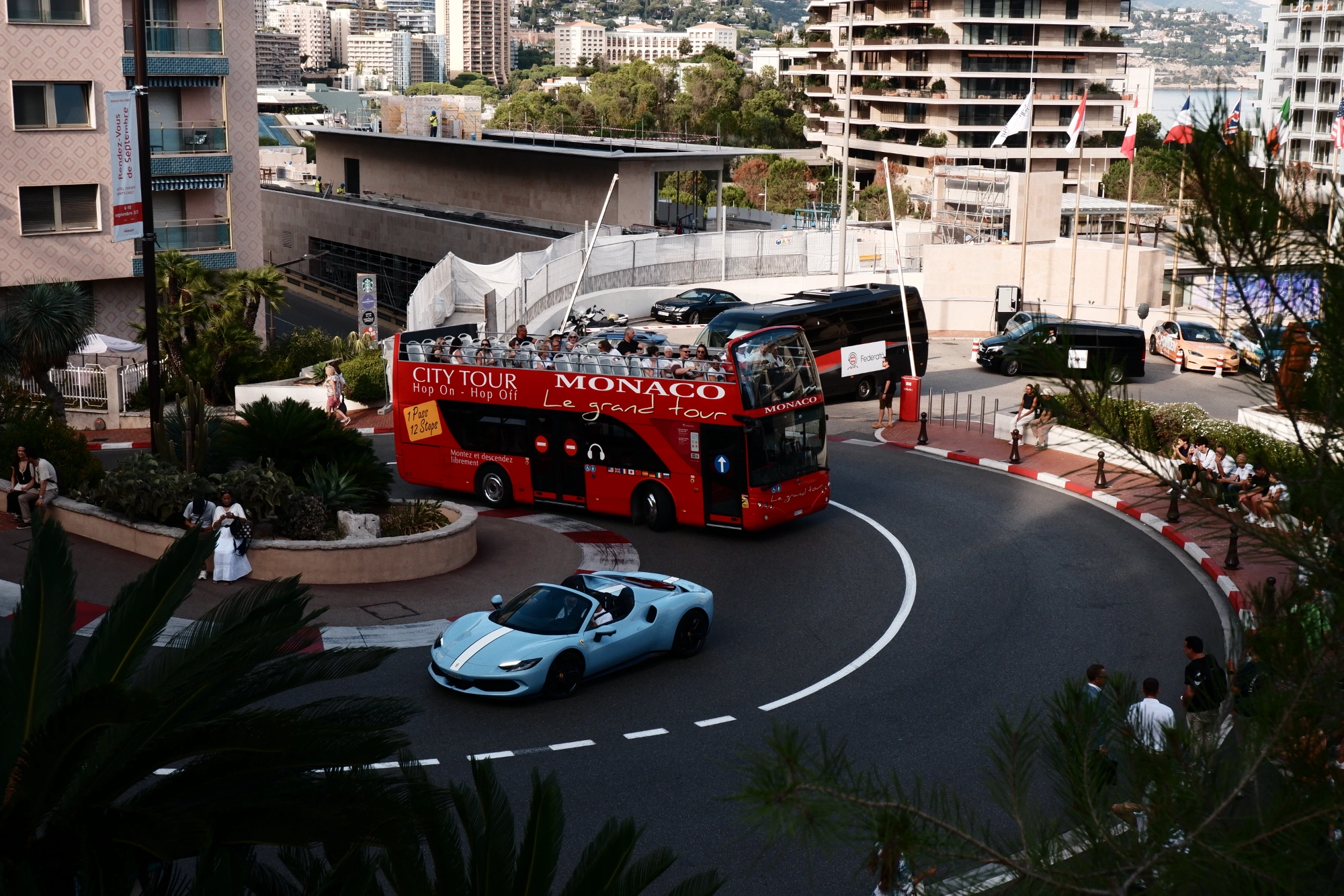 2025-09-08 - xt15-45 - color - MC - Monte Carlo - Cars driving up hairpin bend