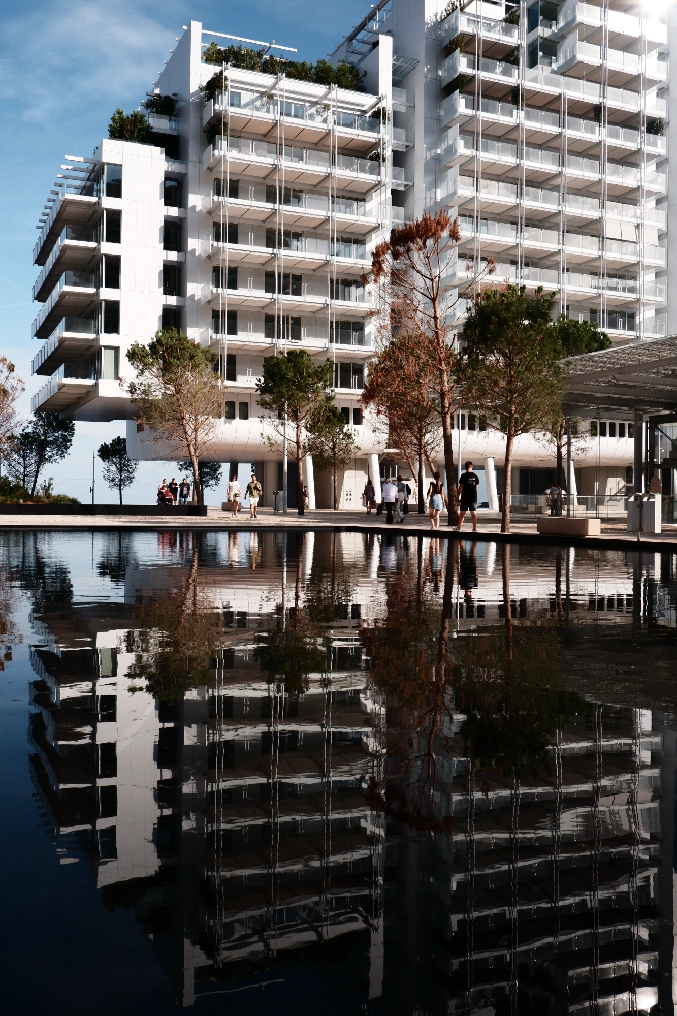 2025-09-08 - xt15-45 - color - MC - Monte Carlo - Reflection of building in the water