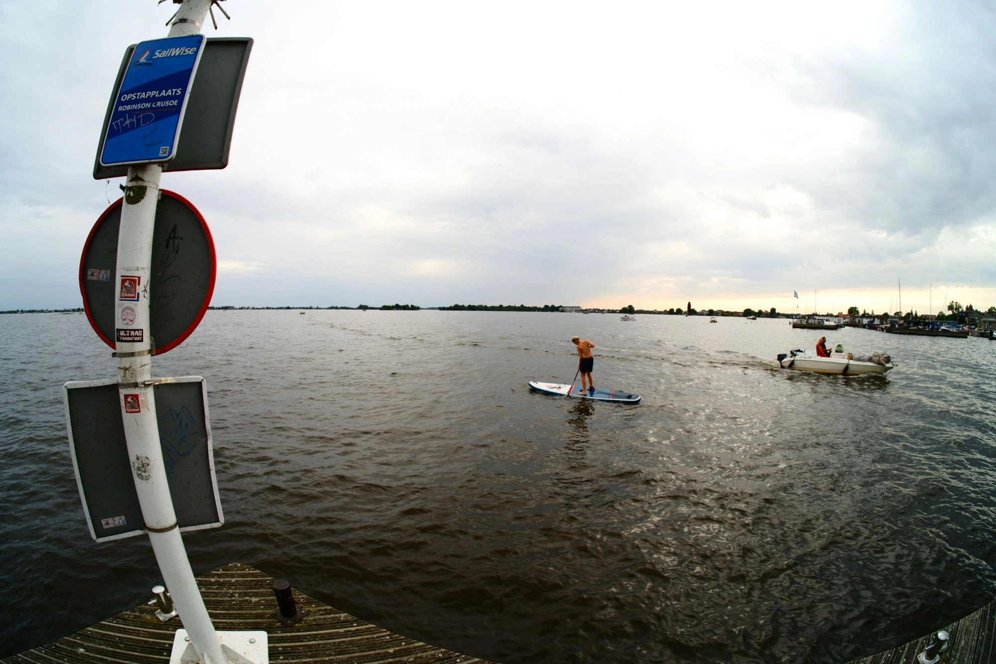 Lake with person on paddle board