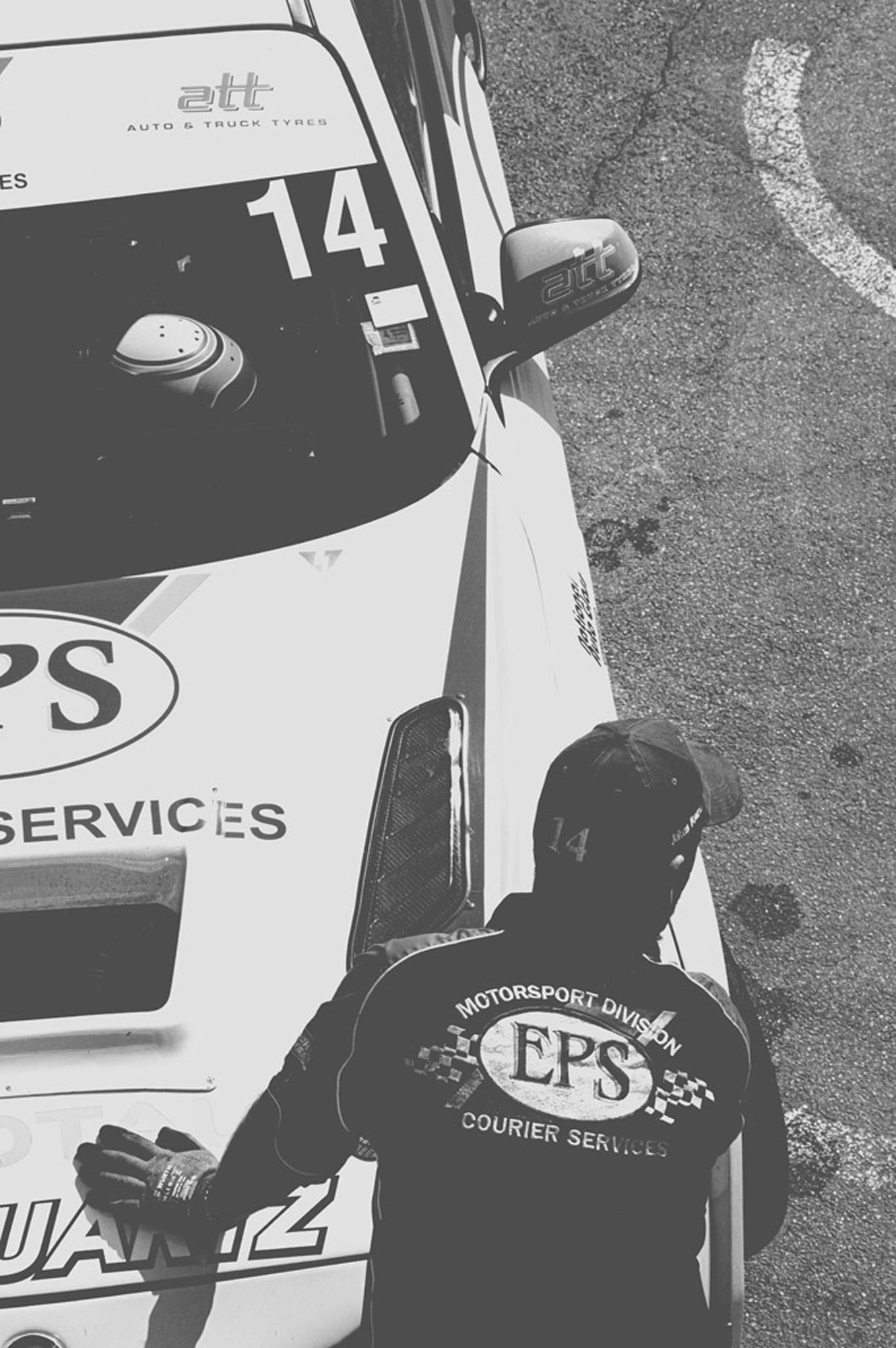 2019-07-27 - n18-55 - bw - ZA - Zwartkops Raceway - Person standing with hand on racecar bonnet