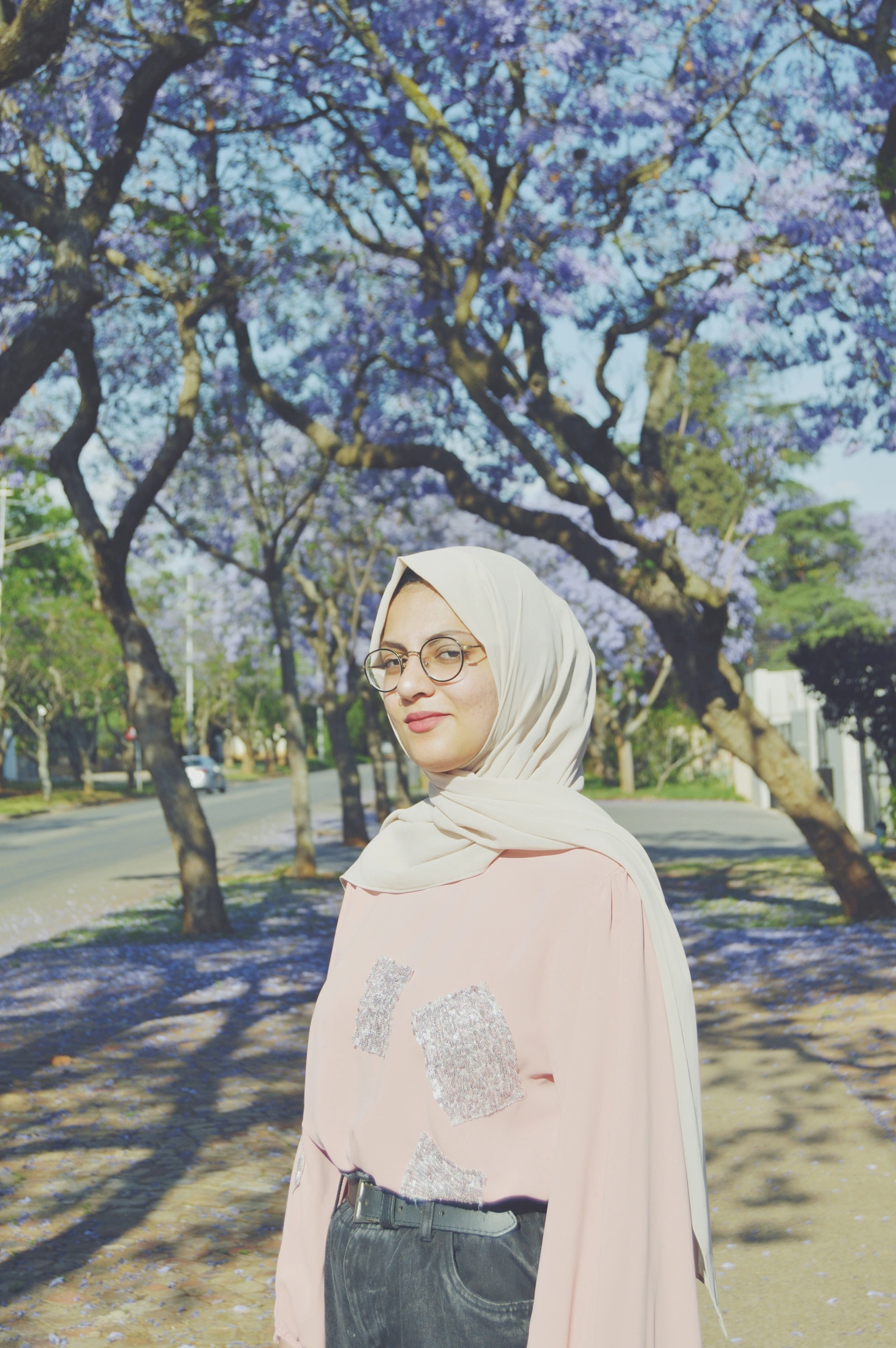 2021-10-17 - n18-55 - color - ZA - Pretoria - Zahrah in front of Jacarandas.jpg