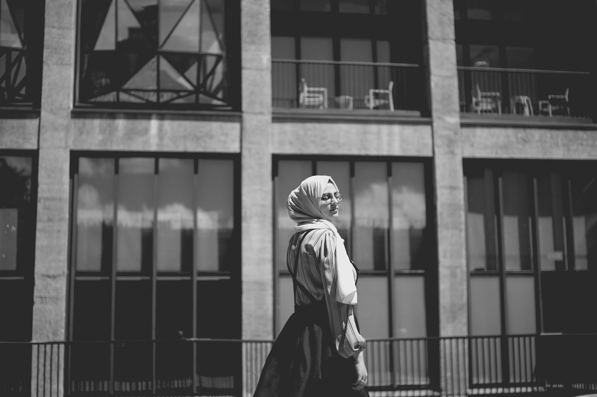 2022-02-16 - Cape Town - Person stands in front of building.j