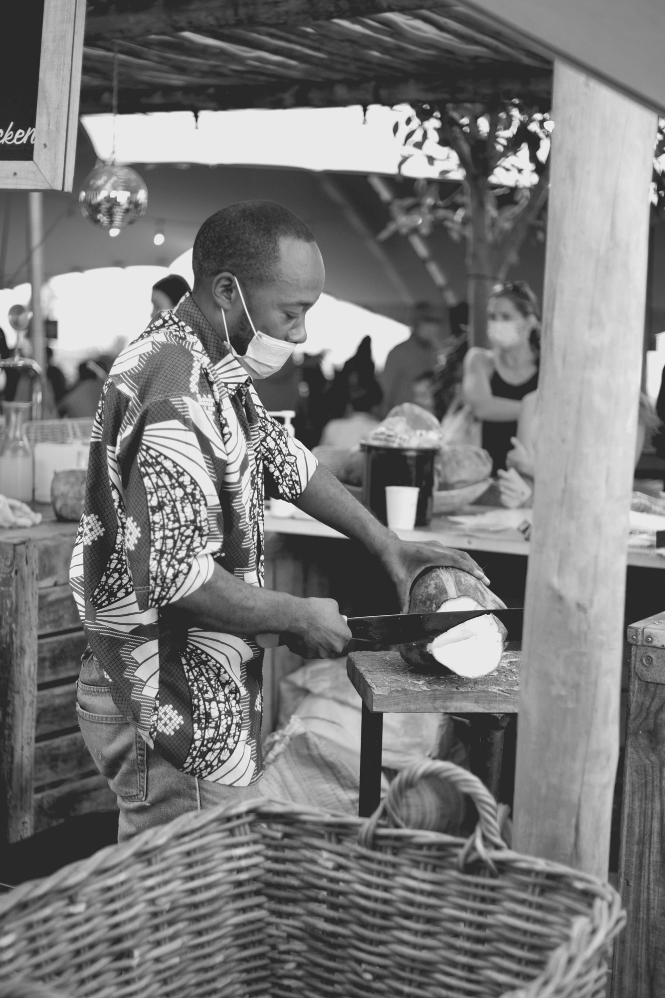 2022-02-18 - Cape Town - Man cuts coconut.j