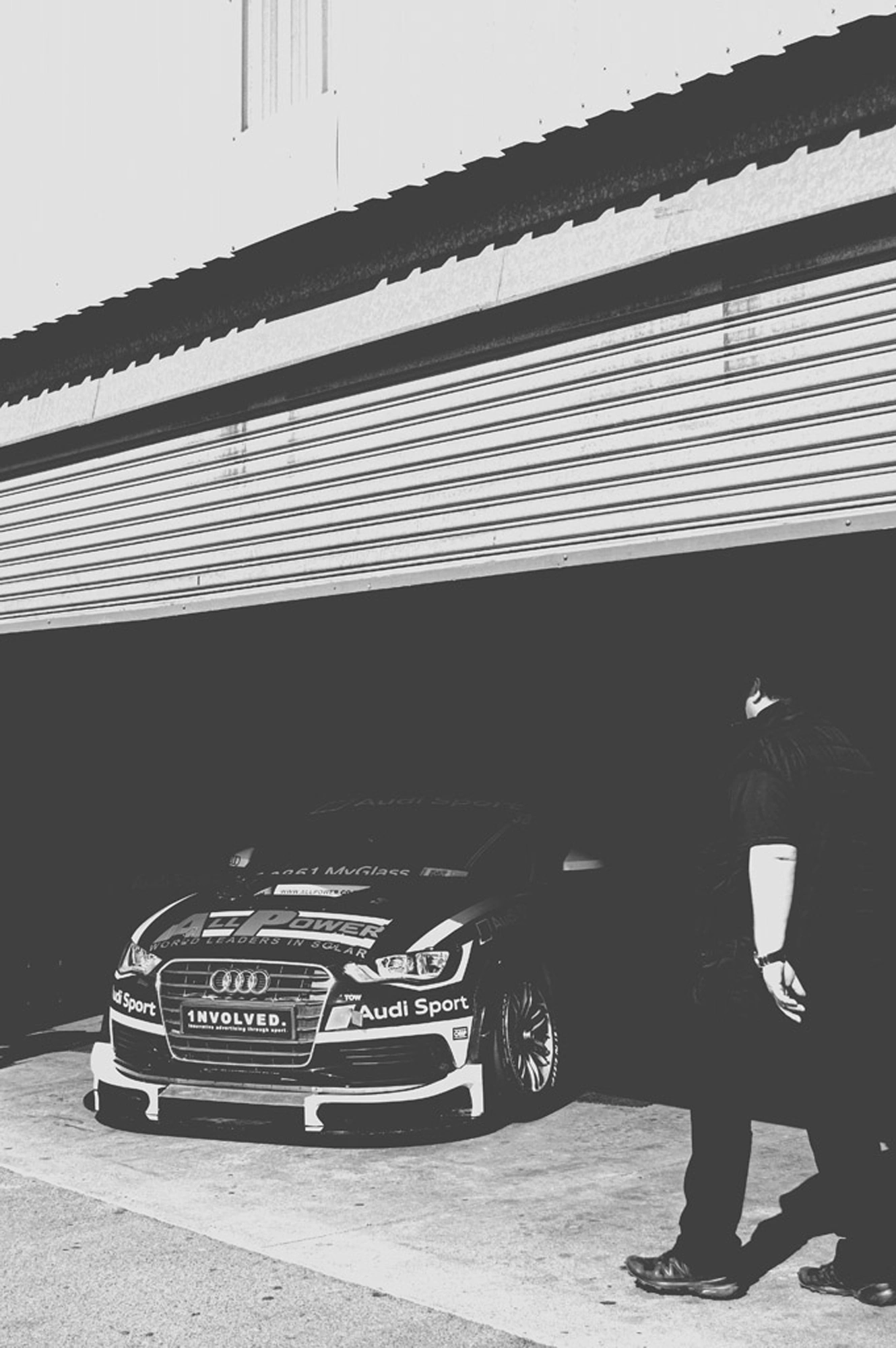 2019-07-27 - Zwartkops Raceway - Man in shadows crossing a racecar.j