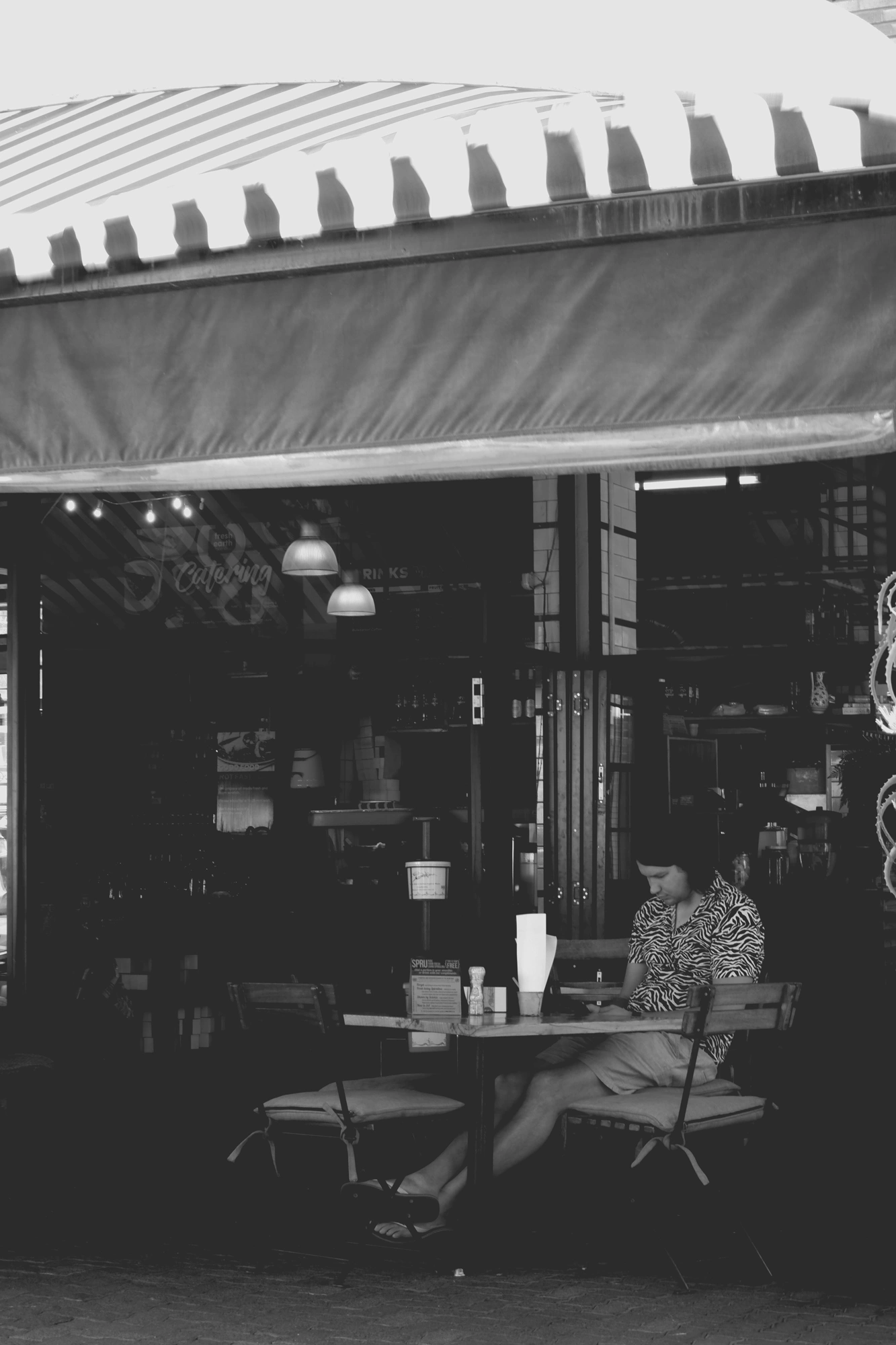 2021-11-07 - Emmerentia, Johannesburg - Person having some coffee.j